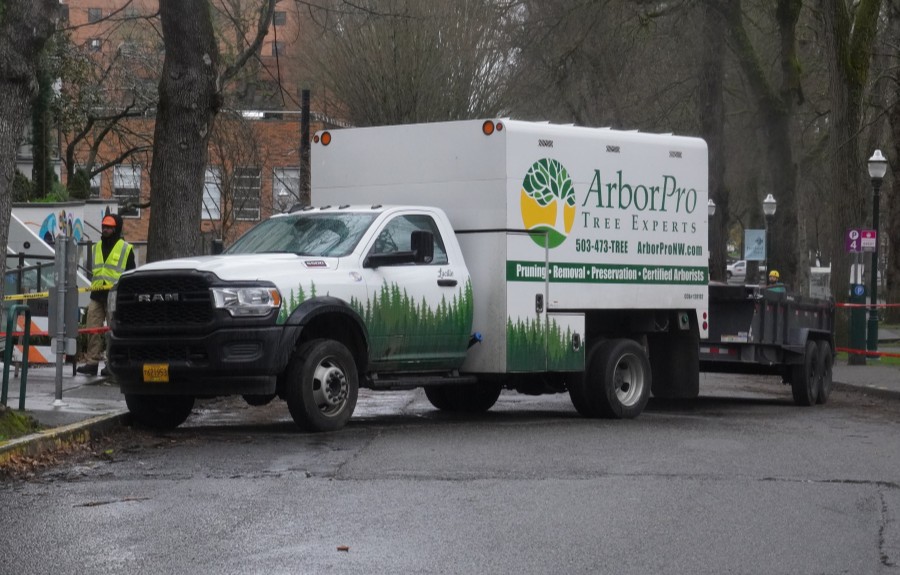 The ArborPro log truck parked on the street in Lake Oswego, OR.